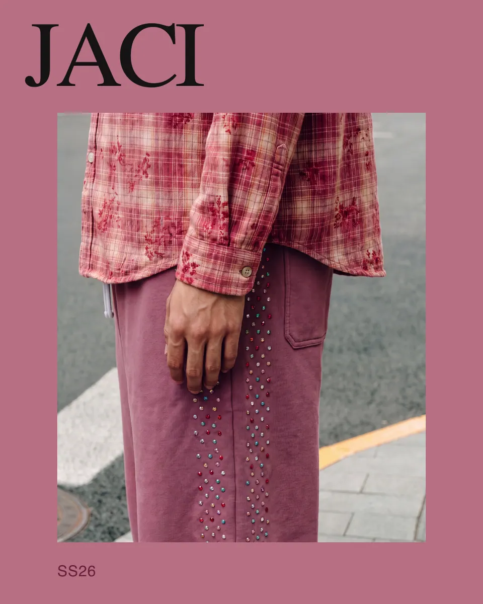 JACI ad: the crystal-seam detail crop inside a pink border.