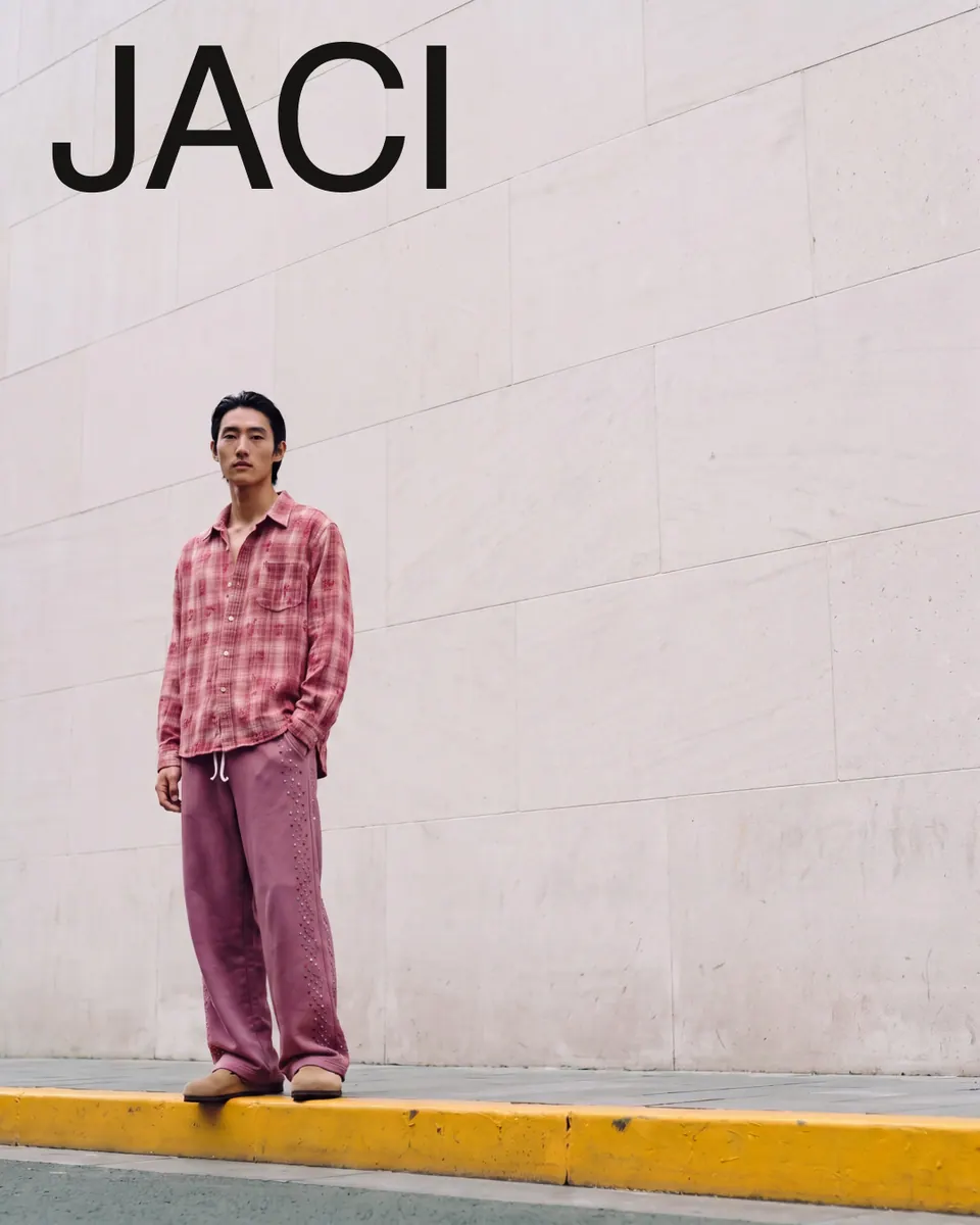Second version of the JACI wall ad: the same photograph with only the JACI name in a heavy sans serif.