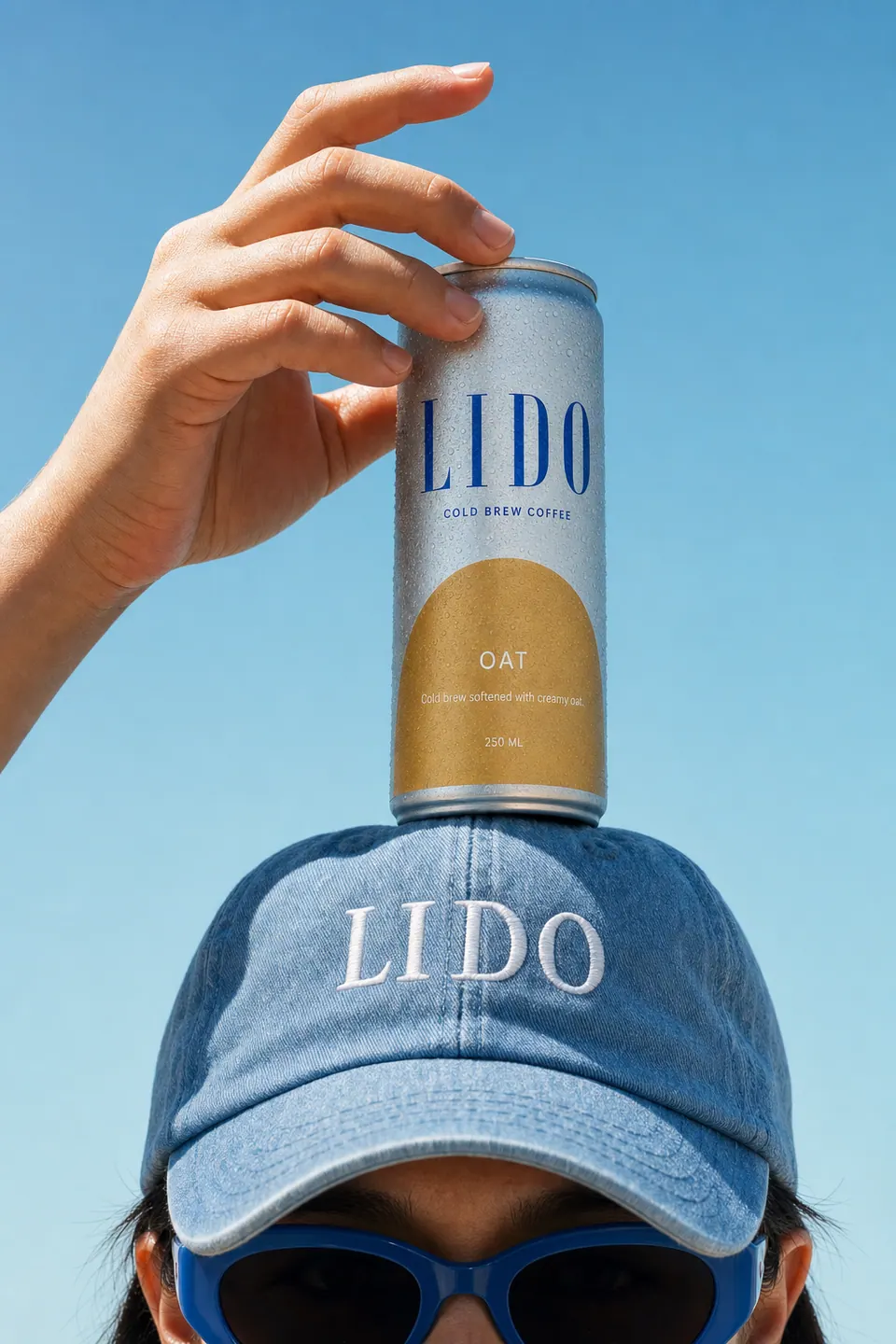 The same pose with a LIDO Oat can balanced on the cap.