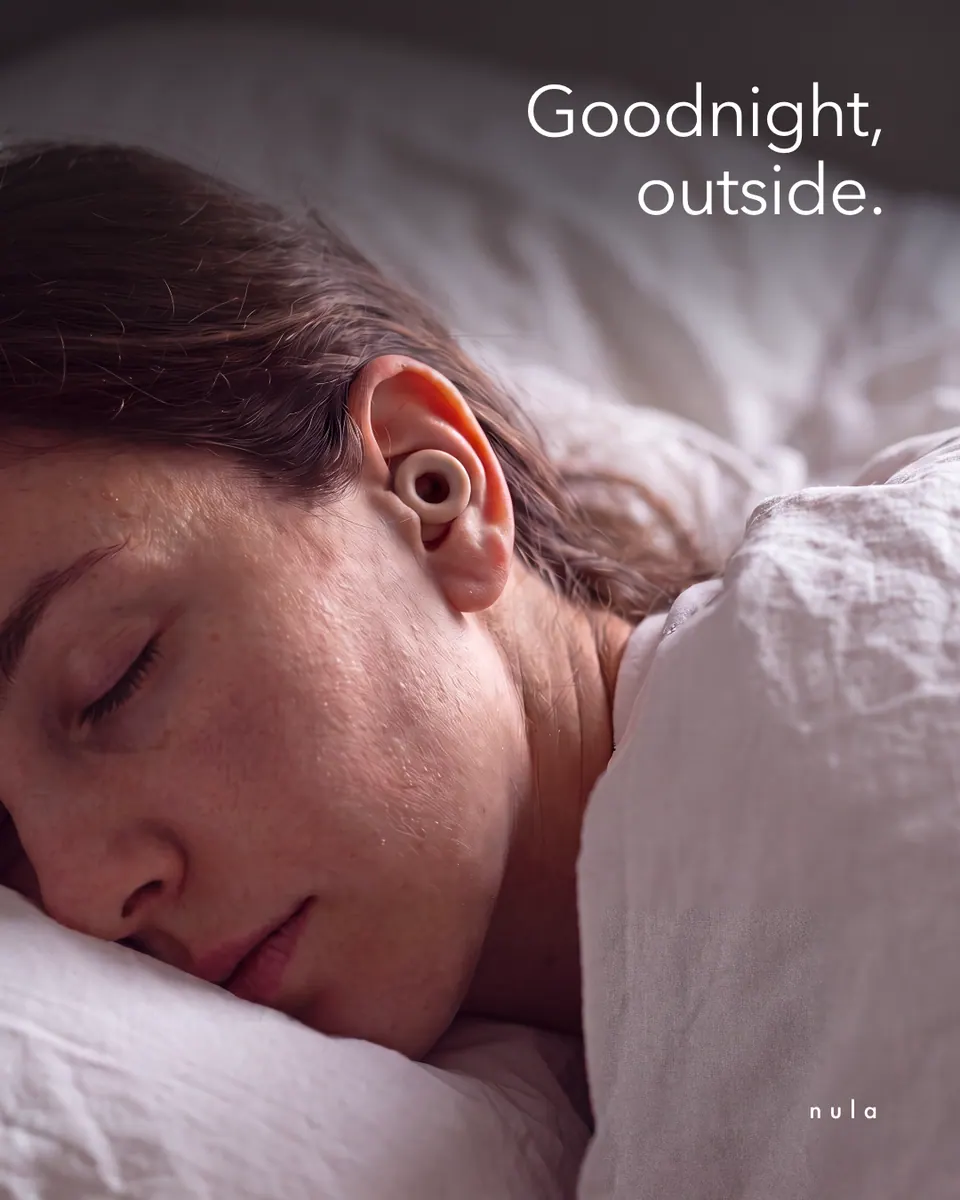 Nula ad: "Goodnight, outside." over the sleeping woman.