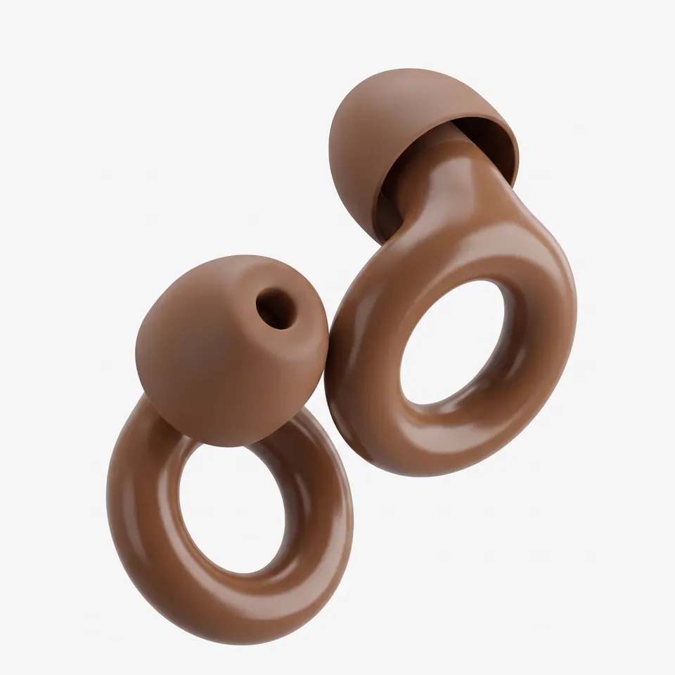 A pair of brown ring-shaped earplugs with soft tips on white.