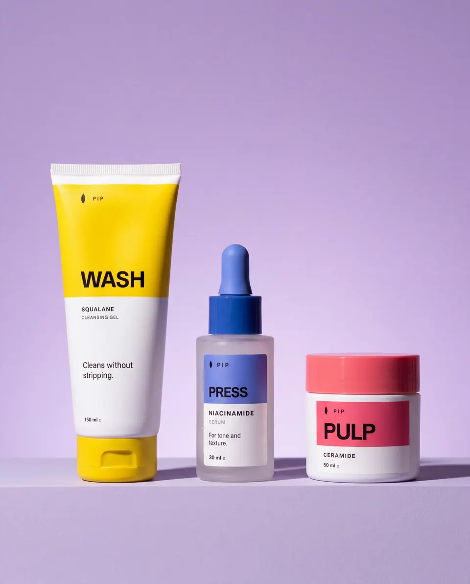 A second lilac studio line-up of the three Pip products, shot lower and wider.
